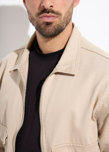 Veste en jean zippée détails élastiqués Beige