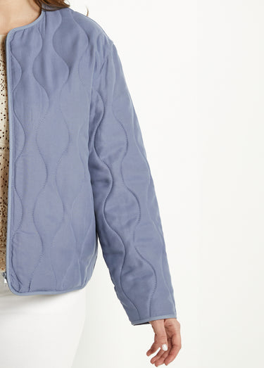 Veste unie matelassée zippée courte col rond Bleu Jean