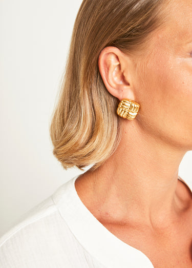 Boucles d'oreilles torsadées carré Dore