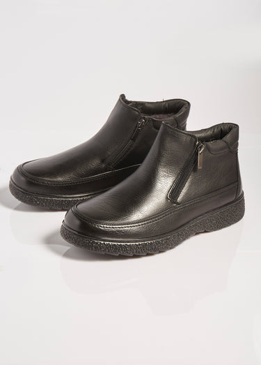 Bottines fourrées zippées à bout rond Noir