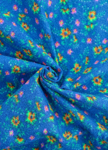 Coupon tissu habillement, fleurs vives Fond Bleu