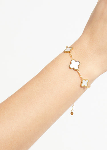 Bracelet avec breloques fleur acier inoxydable et nacre Dore