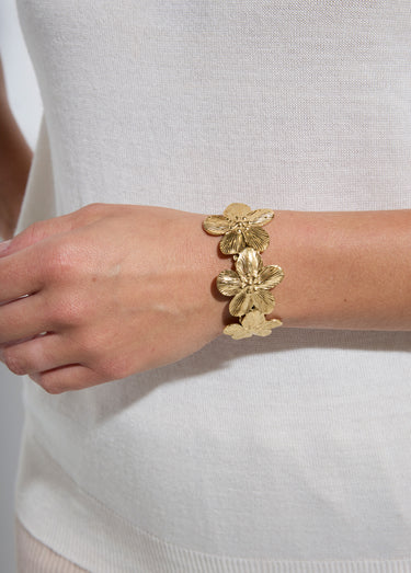 Bracelet jonc fleurs en acier inoxydable Dore