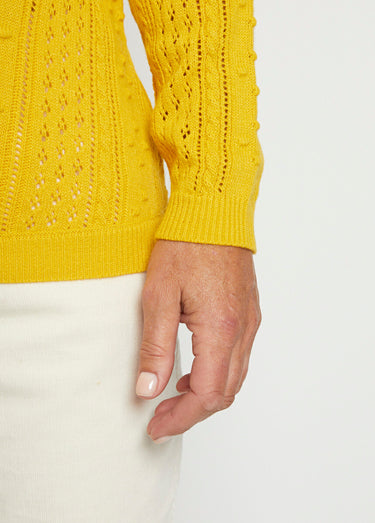 Pull col rond maille ajourée et boules Miel