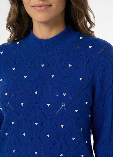 Pull doux ajouré perlé col montant Bleu
