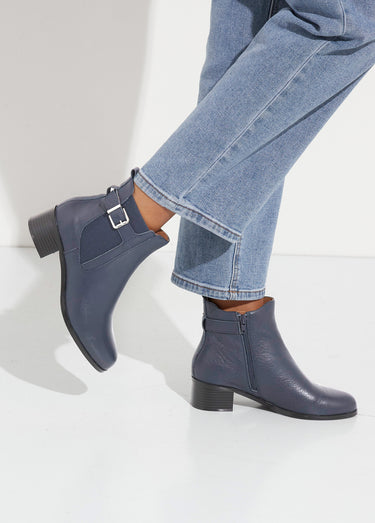 Boots cavalières avec talon, en cuir Marine